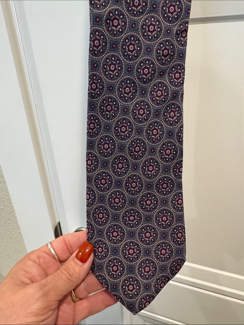 Classic Navy Tie with Burgundy Medallion Pattern